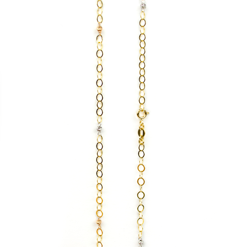 Collana girocollo con catena in oro giallo tit 750 (18 kt), con palline lavorazione slash in oro bianco e rosè alternate; catena rolò tonda e lucida, larghezza 4 mm