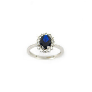 Anello ovale blu zirconi in oro bianco 750, anello donna con pietra blu ovale e cornice di zirconi di dimensione 10 x 12 mm