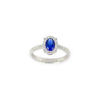 Anello blu ovale oro, anello donna in oro bianco 750 con pietra blu ovale e cornice di zirconi di dimensione 7,20 x 8,80 mm